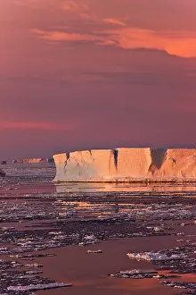 Tabular: Huge iceberg and ice floes in the ocean