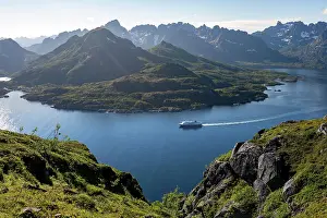 Strait: Hurtigruten cruise ship in the fjord, view of Fjord Raftsund