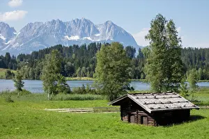Pristine: Hut at Lake Schwarzsee, behind Kaiser Mountains