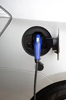Emission: Hybrid Electric Vehicle charging cable and socket