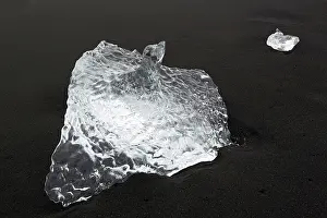 Beache: Ice block on black beach, Iceland, Jokulsarlon