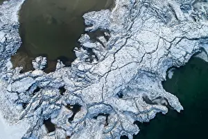Floes: Ice floes and snow in a fjord, Snaefellsnes peninsula