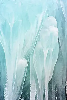 Formed: Ice formation formed at the side of a waterfall