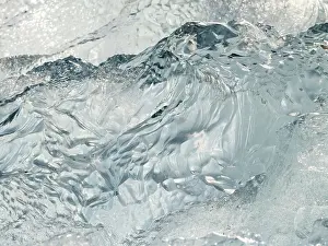Cemetery: Iceberg on black volcanic beach. North Atlantic