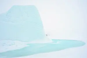 Baffin: Iceberg on frozen Baffin Bay