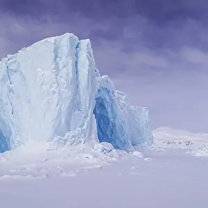 Nunavut: Iceberg in a frozen fjord, coast of Baffin Island