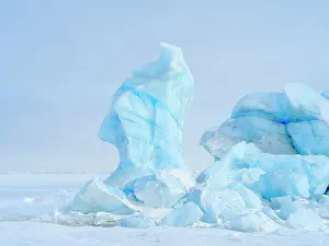 Abandoned: Iceberg in the frozen Mohnbukta in Sabine-Land. The island
