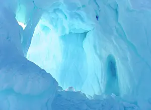 Uummannaq: Iceberg frozen into the sea ice of the Uummannaq