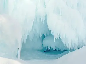 Uummannaq: Iceberg frozen into the sea ice of the Uummannaq