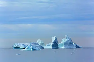 Drifting: Iceberg melting iceberg drifting Arctic ocean Summer