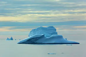 Drifting: Iceberg melting iceberg drifting Arctic ocean Summer