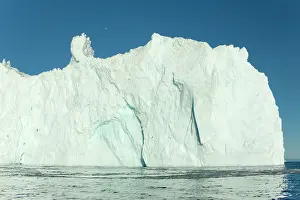 Drifting: Iceberg melting iceberg drifting Arctic ocean Summer