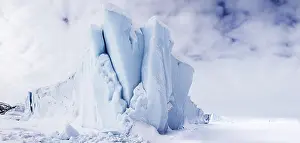 Nunavut: Iceberg seen from frozen fjord, Baffin Island, Davis