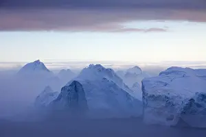 Disko: Icebergs in the mist, Kangia Icefjord, Disko-Bay