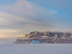 Uummannaq: Icebergs in front of Storen Island, frozen into
