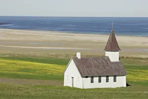 Morris: Iceland. An isolated Christian church near