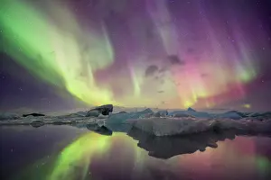 Borealis: Iceland, Jokulsarlon. Aurora lights reflect