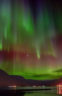Settlement: Iceland. Northern Lights over Isafjordur, the capital of the