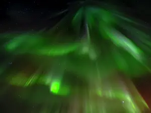 Bizarre: Iceland. Northern Lights over Isafjordur, the capital of the