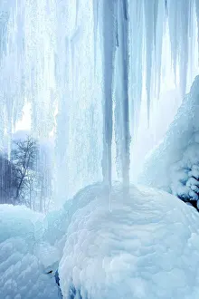 Forecast: Icicles at the waterfall, permafrost with icy landscape