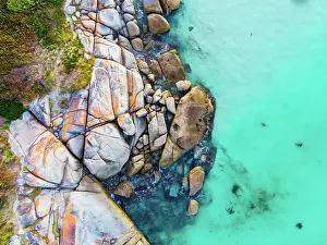 Fires: The iconic lichen covered rocks and turqoise ocean