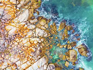 Fires: The iconic lichen covered rocks and turqoise ocean