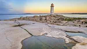 Tower: The iconic lighthouse at Peggy's Cove in early morning light