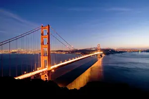 Suspension: Illuminated Golden Gate Bridge at night, San Francisco