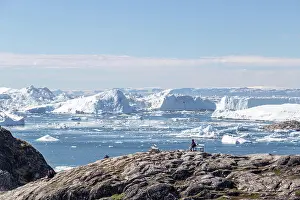 Tourists: Ilulissat, Greenland, June 30, 2018: Tourists at t