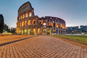 Imposing: The imposing Roman Colosseum in Rome in front of