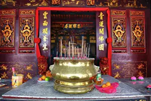 Sticks: Incense sticks burning on the altar at the Cheng Hoon Te