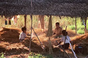 Inle: Inle Lake villagers weaving vegetation