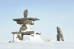 Pillar: Inuktchuk covered by snow, Canada