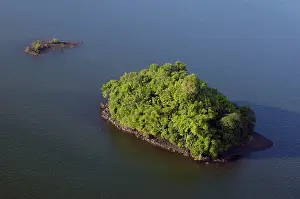 Sulu: An island covered with rainforest vegetation in