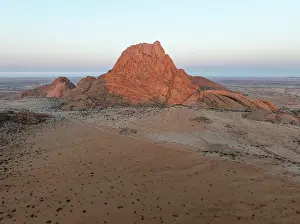 Eroded: The isolated Spitzkoppe mountain (1728 m) majestically rises above the surrounding desert plains