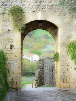 Julie: Italy, Chianti, Monteriggioni. Looking out an arched