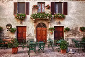 Cafe: Italy, Tuscany, Pienza. Tables and chairs set up