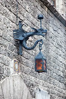 Julie: Italy, Umbria, Assisi. Old stone wall with Dragon Lantern