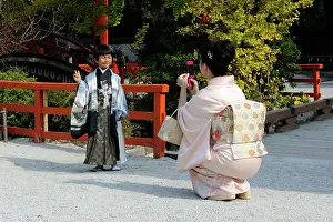 Custom: Japanese boy wearing an ornate Kimono, Hakama culottes
