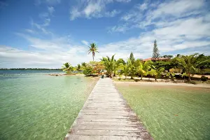 Bodies: Jetty and the beach of Boca del Drago on the island