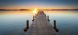 Walkway: Jetty at Wic rthsee at sunrise, fog on the water, Bavaria