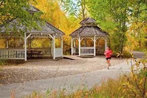 Steamboat: Jogger on trail in urban park, Steamboat