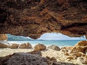Croatia: Karst cave on the sandy beach near the campsite