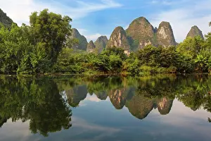 Florissa: Karst formations reflected on Yulong River