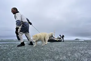Scientists: Kayak Towing on ice Stanwell Fletcher Lake