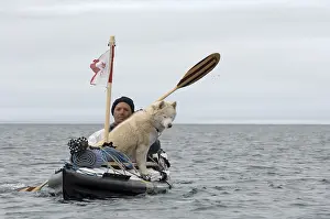 Emblems: Kayaker and his dog Stanwell Fletcher Lake Somerset Island