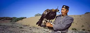 030518: Kazakh hunter with Golden eagle - Taklamakan