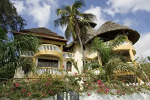 Thatched: Kenya - Traditional style thatched house on waterfront