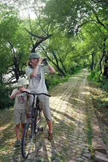 Binoculars: Keoladeo Ghana National Park. Mother and daughter