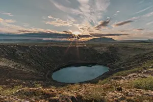 Lights: Kerid crater lake in the golden light of the sun